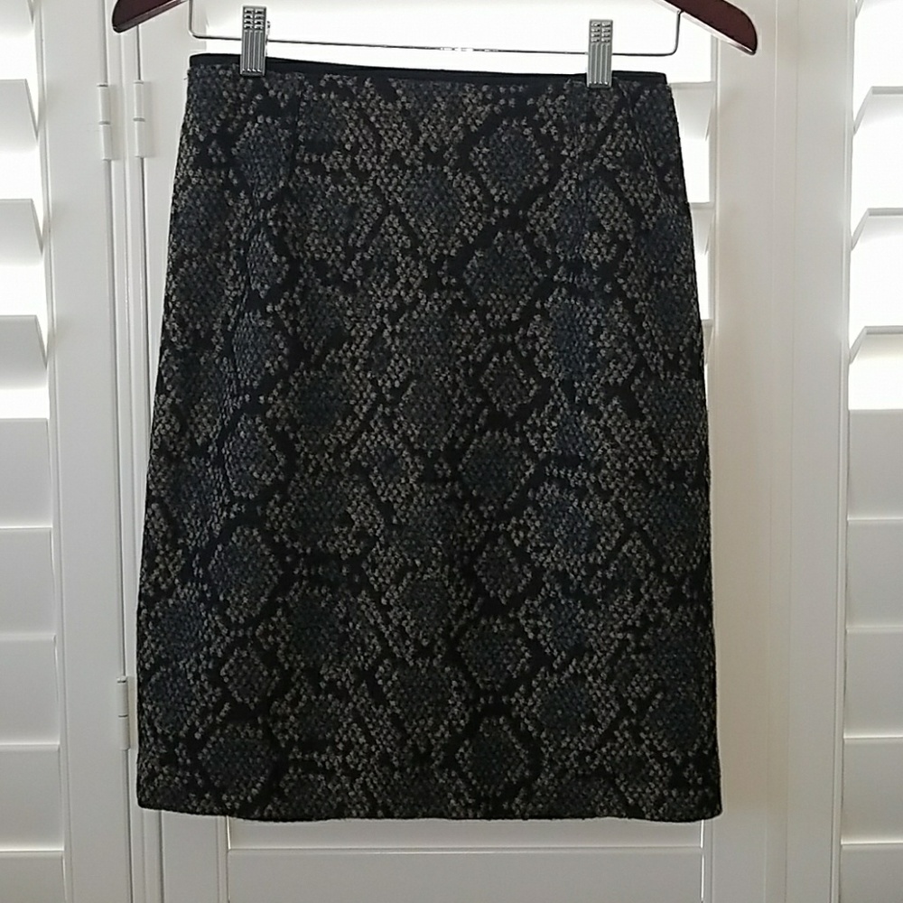 MNG black, blue, and tan patterned skirt.